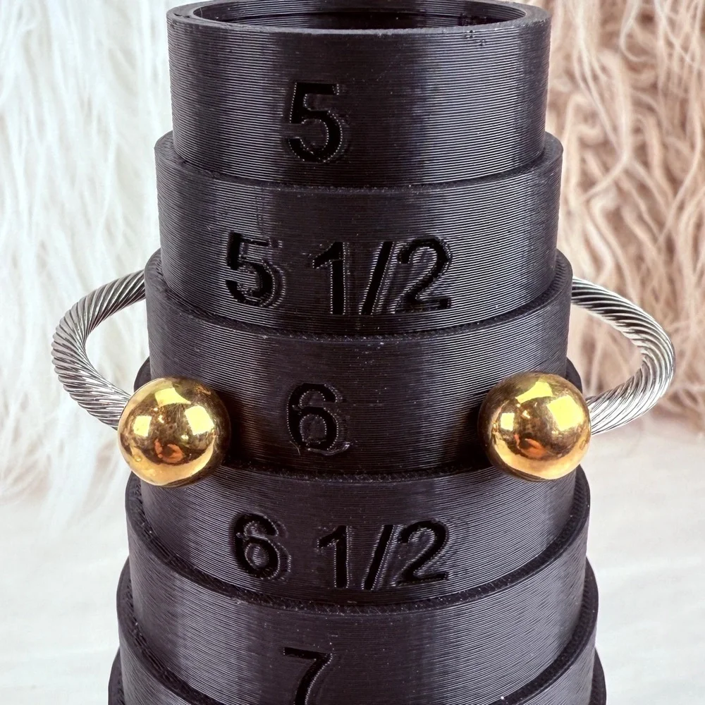 Pretty silvertone and goldtone, twisted cuff bracelet